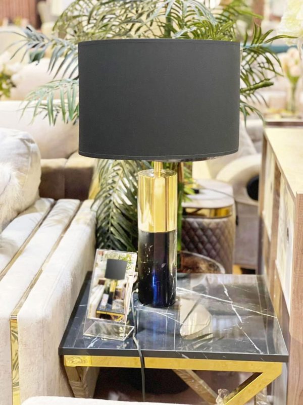 Table lamp from stainless steel and natural marble